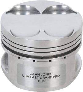 ALAN JONES: Piston from his Williams Ford used in the U.S.A. East Grand Prix (October 7th, 1979). Made by Cosworth Engineering Ltd and with letter of authenticity on letter head signed by Jack Field (Marketing Manager Racing Products for Cosworth Engineer