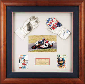 MICK DOOHAN, display with pair of riding gloves (one signed), window mounted with three photographs, framed & glazed, overall 87x88cm.