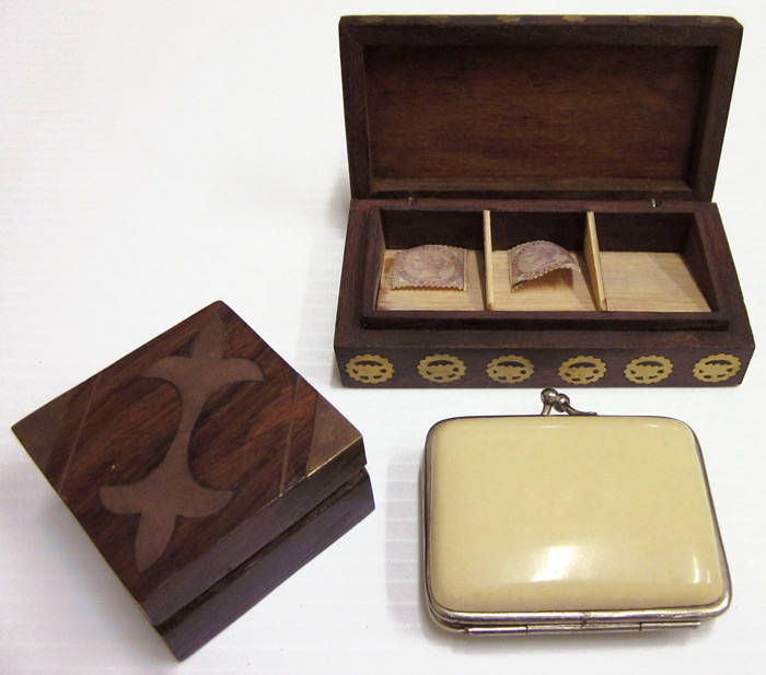 STAMP BOXES: Range, all in various sizes, with 4 in wood incl. a 2 compartment carved box, a single compartment box with brass inlay, a 3 compartment box with multiple brass inlays & a box for strips of stamps; 2 purse types, one in ivorine, the other lea