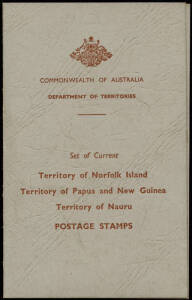 AUSTRALIAN TERRITORIES: June 1958 Post Office "SPECIMEN" folders, each containing Nauru to 5/- CTO, Norfolk Island to 5/- CTO and PNG to 10/- Map & £1 Fisherman, both overprinted SPECIMEN.