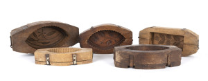 Five French carved wooden butter presses, 19th century
