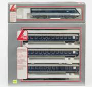 MODEL RAILWAYS: LIMA: XPT Country Link Locomotive (205003L), Rolling Stock Comprising of a 3 Piece DB ‘Touropa’ Passenger Car Set (149796). Mint in original cardboard packaging. (2 items)