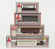 MODEL RAILWAYS: LIMA: Pullman 73101 The Royal Alex, Commemorative Edition Diesel Locomotive (205186A5), with Rolling Stock Comprising of a Covered Freight Car, Small Tank Car ‘St Ivel’ (305641A5), SAR Rail Guards Car (305621A1). All mint in original cardb