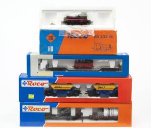 MODEL RAILWAYS: ROCO: Diesel Locomotive DB Class BR 333 (04163A), with rolling stock, comprising of Rungswagon (44083), ‘OHU’ ‘Sand-Kies-Edelsplitt Goods Car (44190), Low Loader Car with Narrow Gauge Locomotive (4334A). All mint in original cardboard pack