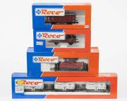 MODEL RAILWAYS: ROCO: Electric Locomotive SBB Ee 3/3 (43528) Plus Rolling Stock, Comprising of &lsquo;Karsdorfer Zement&rsquo; & &lsquo;EVA&rsquo; Silo Car Set (44055), A Pair of DB freight Car (46001). All mint in original cardboard packaging. &nbsp;(4 items)