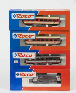 MODEL RAILWAYS: ROCO: Electric Locomotive OBB 1099 007-5 (43528) Plus Rolling Stock, Comprising of OBB 2nd Class Passenger Car (34008), OBB 2nd Class Passenger Car (34000), OBB 2nd Class Passenger Car (34002). All mint in original cardboard packaging. &nbsp;(4