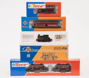 MODEL RAILWAYS: ROCO: Diesel Locomotive N.S. SIK Series 200-300 (04153A) Plus Rolling Stock, Comprising of DB Self-unloading Dirt Container Car Set (44128), Self Unloading Container Car (4370A), DR Self Unloading Container Car (46433). All mint in origina