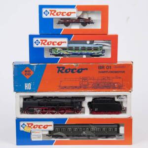 MODEL RAILWAYS: ROCO: DR BR 01 Steam Locomotive with Tender (04119C), with Rolling Stock Comprising of DR 2nd Class Passenger Car (44678), OBB Passenger Car (34021), DR Open Low Hopper Car (46441). All mint in original cardboard packaging. (4 items)