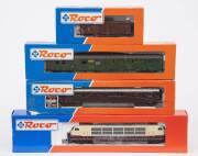 MODEL RAILWAYS: ROCO: DB Series 103 120-2 Electric Locomotive (43442), with Rolling Stock Comprising of FS 1st Class Passenger Car (44712), SBB Post Car (44406), OBB Covered Freight Car (34522. All mint in original cardboard packaging. (4 items)