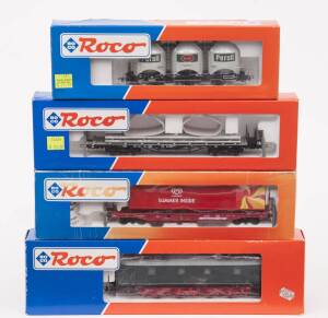 MODEL RAILWAYS: ROCO: DR Series 18 31 Electric Locomotive (43815), with Rolling Stock Comprising of DBAG &lsquo;Langnese&rsquo; Freight Car (47633), DB Aluminium Loaded Stake Car (47724), DB &lsquo;Persil&rsquo; Silo Car (47321). All mint in original cardboard packaging. (4 item