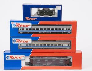 MODEL RAILWAYS: ROCO: BLS AE 6/8 Electric Locomotive (43710), with Rolling Stock Comprising of HZ 1st Class Passenger Car (44254), SZ 2nd Class Passenger Car (44355), DB Baggage Car (34041). All mint in original cardboard packaging. (4 items)