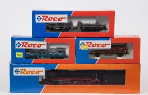 MODEL RAILWAYS: ROCO: DB BR 042 Steam Locomotive (43244), with Rolling Stock Comprising of DB Rung Car Loaded with Steal Beams (46550), SNCB Cargo Car Loaded with Steel Coils (47433), DB Open Freight Car (46090). All mint in original cardboard packaging. 