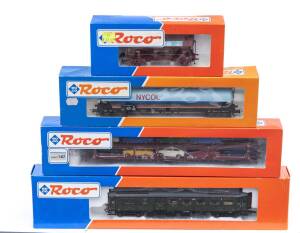 MODEL RAILWAYS: ROCO: NS CD 9104 Electric Locomotive (43744), with Rolling Stock Comprising of DB Automotive Transporter Loaded with Cars (46630), SJ Silo Car ‘NYCOL’ (46198), DB  Pan-Tilt Car ‘Quarzsand’ (46438). All mint in original cardboard packaging.