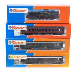 MODEL RAILWAYS: ROCO: KPEV T14 8976 Bin Steam Locomotive (63260), with Rolling Stock Comprising DR 3rd Class Passenger Car (44533), DRG 3rd Class Passenger Car (44545), DB 3rd Class Passenger Car (44538). All mint in original cardboard packaging. (4 items