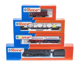 MODEL RAILWAYS: ROCO: DRG BR 44 1095 UK GRAU Steam Locomotive with Tender (43352), with Rolling Stock Comprising DB Rungs Car Loaded with Marble Blocks (47219), DB Covered Freight Car (46001), OBB Deep Well Flat Car with 2 Containers (46379). All mint in 