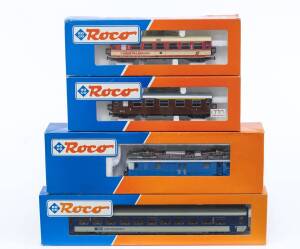 MODEL RAILWAYS: ROCO: SBB Fe 4/4 Electric Locomotive (43631), with Rolling Stock Comprising of SBB 2nd Class Passenger Car (44475), OBB 2nd Class Passenger Car (34010), DB 1st & 2nd Class Passenger Car (34003). All mint in original cardboard packaging. (4