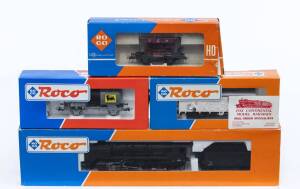 MODEL RAILWAYS: ROCO: OBB BR 44 541 Steam Locomotive with Tender (43266), with Rolling Stock Comprising SBB Tank Car (46668), DB Covered Freight Car (46047), OBB Talbot Gravel Carriage (4334B). All mint in original cardboard packaging. (4 items)