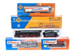 MODEL RAILWAYS: ROCO: DB BR 01 Steam Locomotive (04119A) with Rolling Stock Comprising NS Self-unloading Car ‘Kalk’ (44444), BLS Tipping Grain Car (46245), Large Freight Car (4340A). All mint in original cardboard packaging. (4 items)