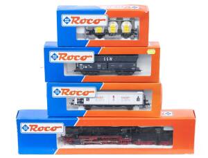 MODEL RAILWAYS: ROCO: DB BR 052 440 5 Steam Locomotive (43284) with Rolling Stock Comprising DB Silo Car (46526), BLS Large Covered Freight Car (47931), SNCF Open Freight Car Loaded with Coal (46241). All mint in original cardboard packaging. (4 items)