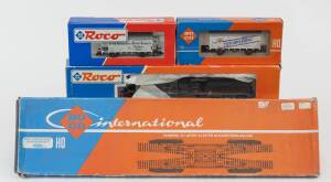 MODEL RAILWAYS: ROCO: DB BR 18 133 Steam Locomotive with Tender (43217), with Rolling Stock Comprising of DB Covered Freight Car (46015), DB Covered Freight Car (4305) Also Includes Double Parallel Track Connection (4560). All mint in original cardboard p