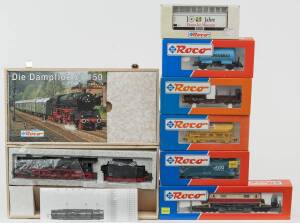 MODEL RAILWAYS: ROCO MUSEUMS EDITION: DB BR 01 150 Steam Locomotive (43238), with Rolling Stock Comprising of OBB Heavy Duty Car Loaded with Mariazellerbahn E-lok series 1099 - 1099 04 (47183), DB Tank Car (47063), OBB Rung Car (34521), SNCF Gravel Loaded