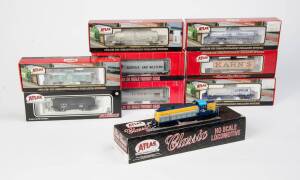MODEL RAILWAYS: ATLAS: RS-3 Locomotive (Ontario Northland) plus rolling stock, comprising a Kaolin Tank Cars (Cyprus & Georgia Kaolin), 6 Bay Cylindrical Hopper (Norfolk and Western), 36' Wood Reefer Car (Kahn's), 17,600 Gallon Corn Syrup Tank Car (Cargil