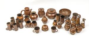 JUNE DYSON (1919-2004) A collection of brown and yellow glazed earthenware vessels jugs and bowls