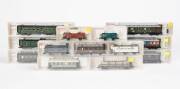 FLEISCHMANN: HO scale carriages and freight cars comprising #5780K, 5782K, 5783K, 5835K, 5861K, 5873K, 5882K, 5887K, 5889K, 5890K, 5891K, 5892K & 5898K. All NIB. (13 items)