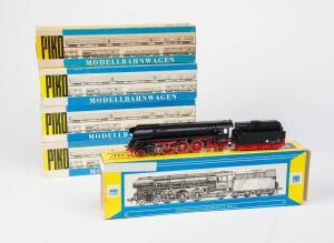 PIKO: HO scale steam locomotive with tender BR 01.5 together with passenger cars 5/6507, 5/6510 (2) & freight car 5/6419-015. All appear NIB. (5 items).