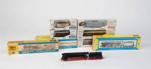PIKO: HO scale steam locomotives with tenders: BR52 19-20 & BR01.5 plus 7 various passenger and freight cars. All in makers' boxes. (9 items).