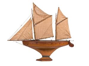 A working model pond yacht on stand, early 20th century