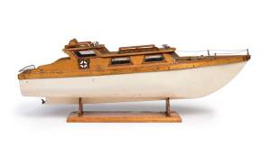 A vintage boat model on stand, mid 20th century