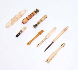 Two whalebone seals, two snuff spoons, whalebone brooch and three implements, 19th century