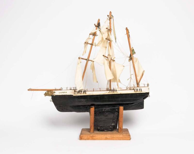 A folk art model of a three masted ship named Chimera