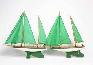 A pair of green and white painted timber pond yachts, 20th century