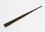 A rare Australian whip handle carved with kangaroos, emus, Aboriginals and animal motifs, studded with brass nails, 19th c