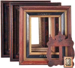 PICTURE FRAMES: Matched pair of ornate Victorian frames in wonderful condition 36x42cm; Victorian frame with ornate carved ebony slip; WWI prisoner carved (chip art) with naval ensignia on top; sterling small easel decorated with faceted topaz (?) hallmar