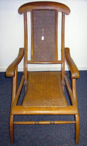 Antique folding easy chair with hand caned rattan seat and back. VG condition.