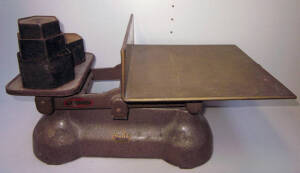 Ajax scales with brass parcel tray, and blue metal scales by "Mercury Scales Co.", with weights, Good condition.