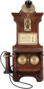 ANTIQUE TELEPHONE. 1895 Western Electric wall phone. Walnut case. Restored and in working order (seperate dial box, not original). Ex P.M.G (Post Master General). A rarity. VG condition.
