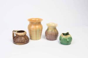 Four Remued pottery vases, one with branch handle