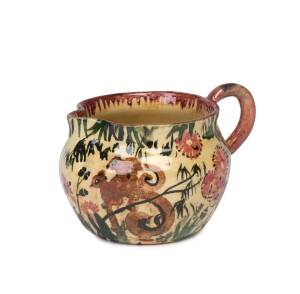 NEIL DOUGLAS & ARTHUR MERRIC BOYD An earthenware glazed jug with ring-tailed possums among waratahs