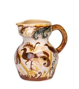 NEIL DOUGLAS, JOHN PERCEVAL & ARTHUR MERRIC BOYD An earthenware glazed jug with lyrebirds and ferns