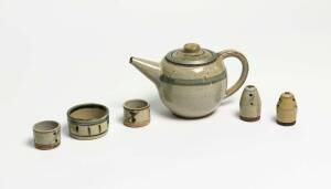 HAROLD HUGHAN Pottery teapot, pair of condiments, pair of salts and condiment dish