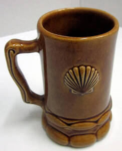 SHELL OIL memorabilia: mugs (5), ashtrays (12), old sports equipment, miniature replica bowser dispensers, etc.