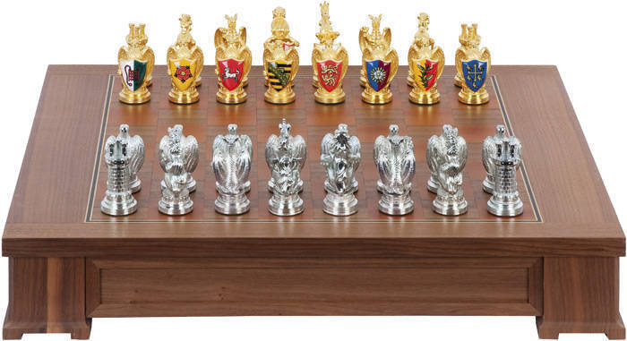 FRANKLIN MINT, "The Royal Houses of Britain Heraldic Chess Set". Gold and silver plated pewter pieces bearing crests. Inlaid wooden games board with 2 drawers felt lined with individual compartments to house pieces. Limited edition of 2500 set were made i