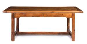 A rustic pine farmhouse refectory table with breadboard ends, 20th century 