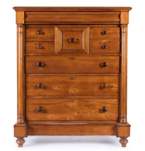 A Tasmanian huon pine eight drawer chest with turned columns solid huon drawer fronts with blackwood handles, circa 1860