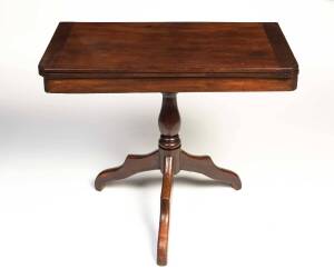 An Australian cedar fold-over card table, 19th century