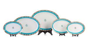 GEORGE LANSELL crested family porcelain dinnerware by Mintons comprising five graduated meat platters